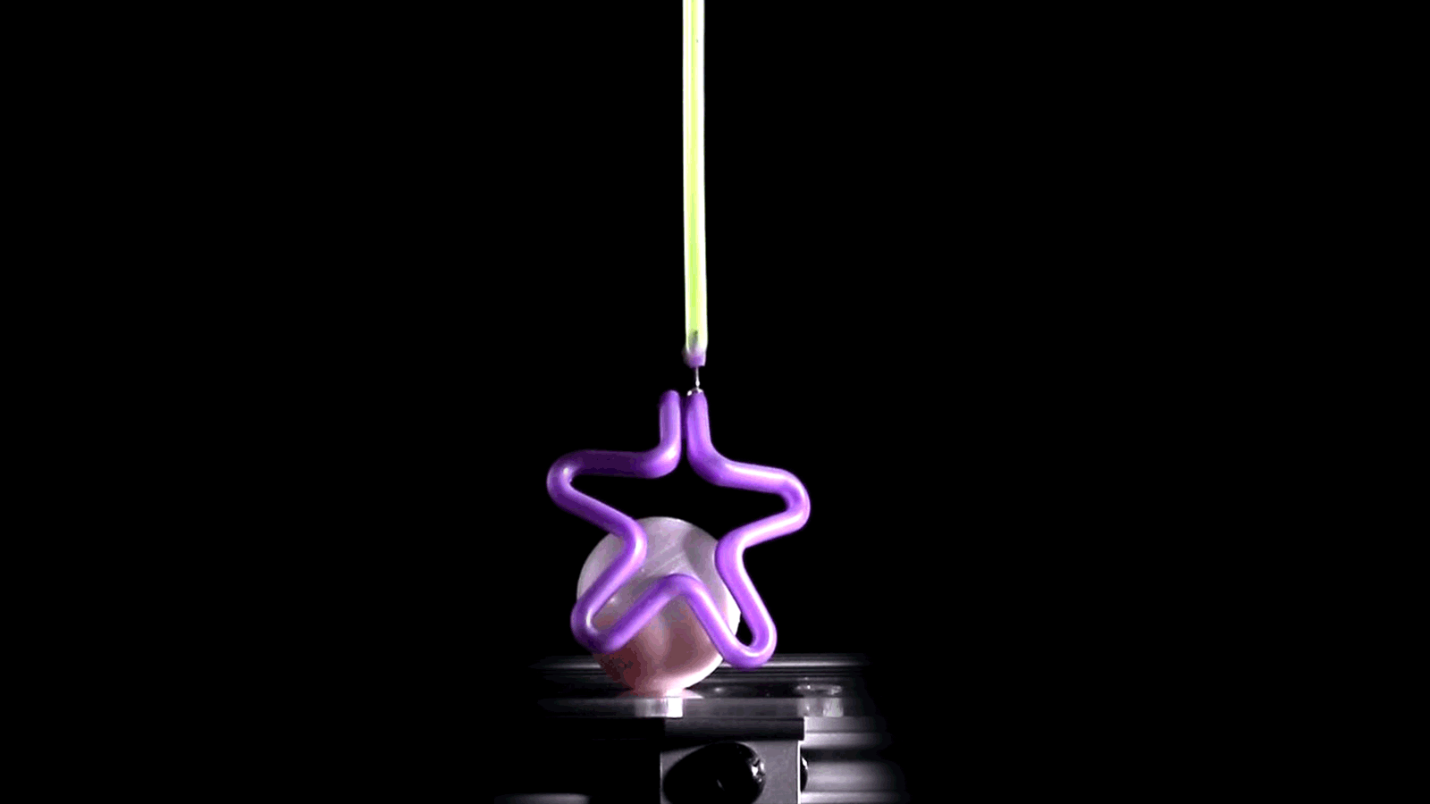 When filled with air, the soft robot can grab and lift a ball